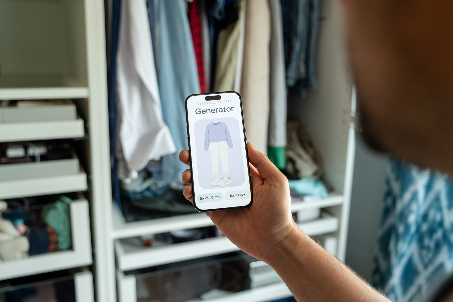 Man using virtual outfit generator app on smartphone